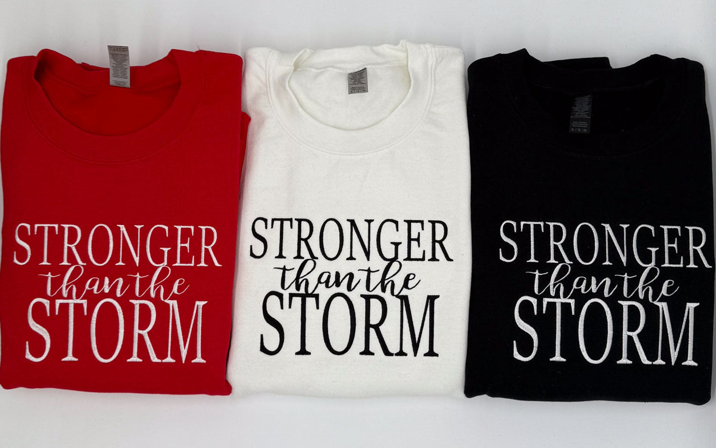 "Stronger Than The Storm" Embroidered Sweatshirt - GOdCREATEd