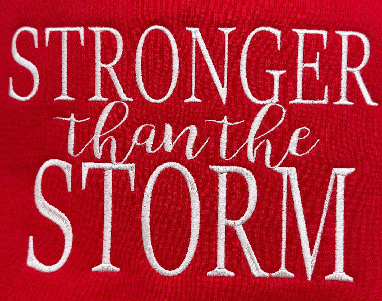 "Stronger Than The Storm" Embroidered Sweatshirt - GOdCREATEd