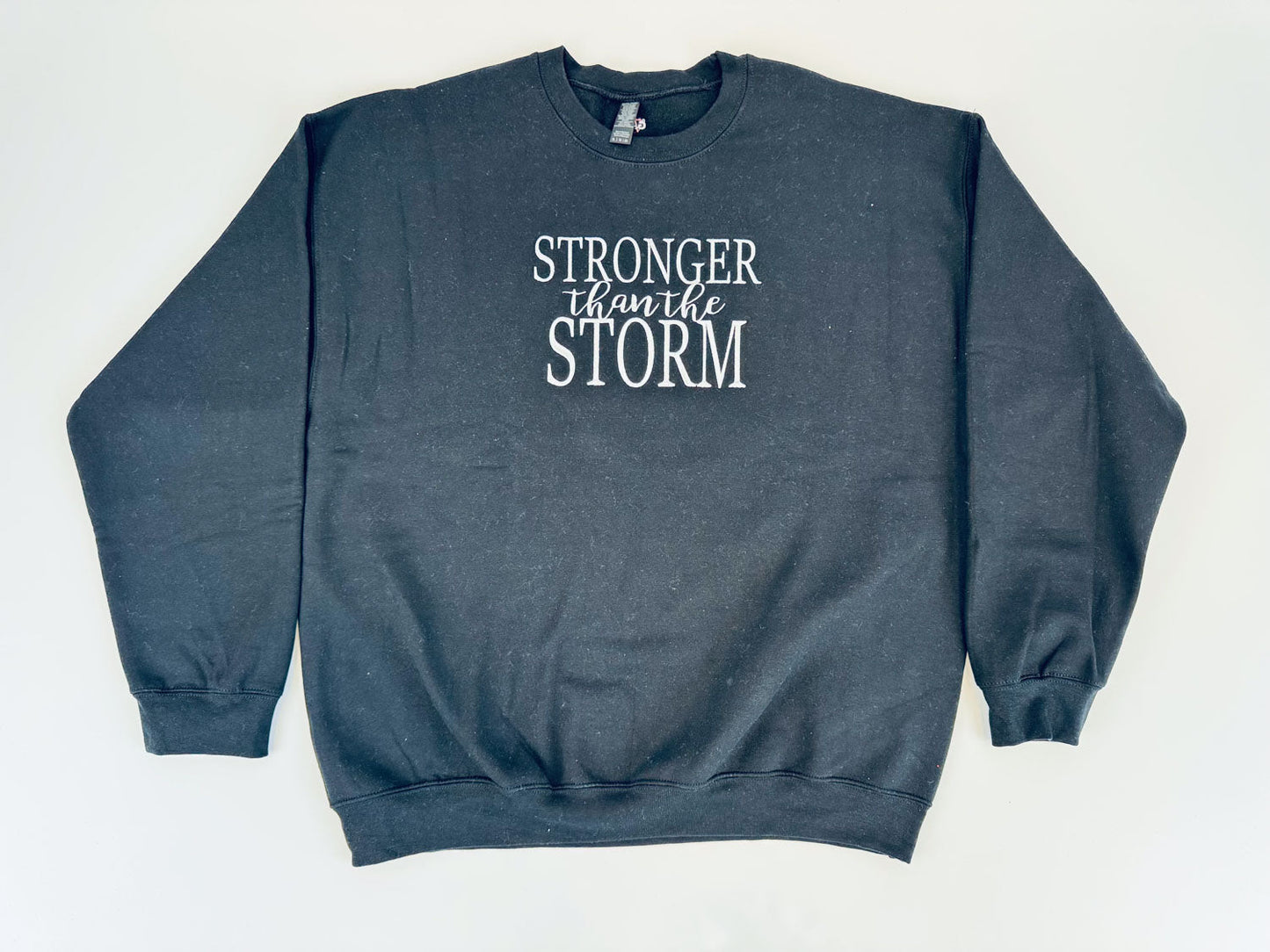 "Stronger Than The Storm" Embroidered Sweatshirt - GOdCREATEd