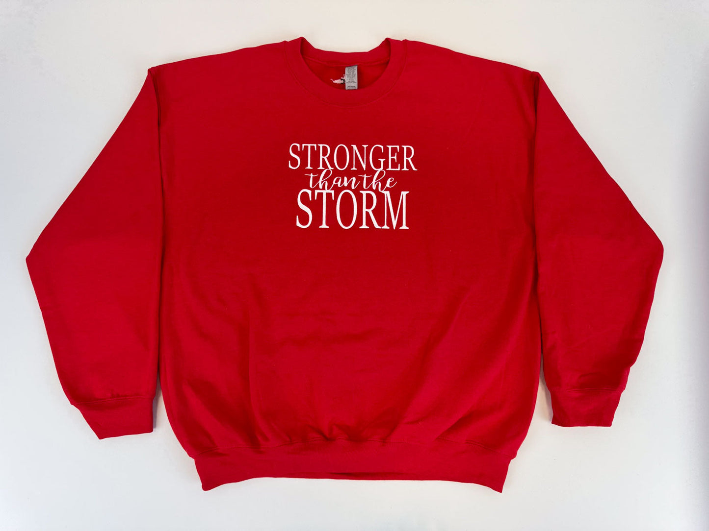 "Stronger Than The Storm" Embroidered Sweatshirt - GOdCREATEd