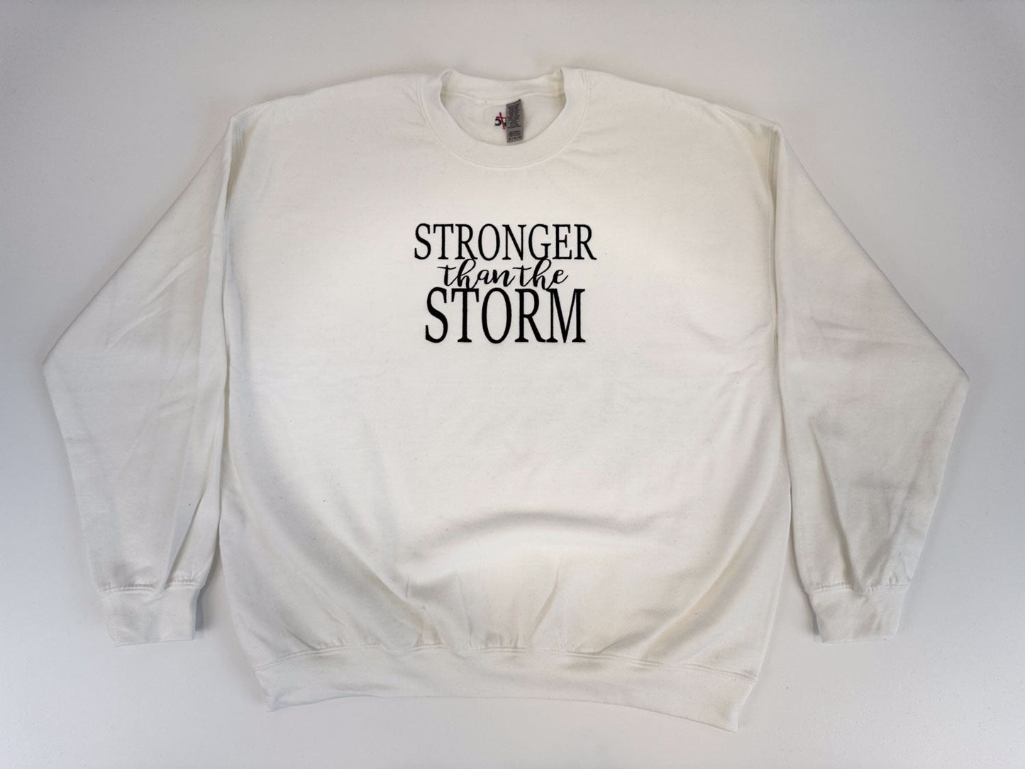 "Stronger Than The Storm" Embroidered Sweatshirt - GOdCREATEd