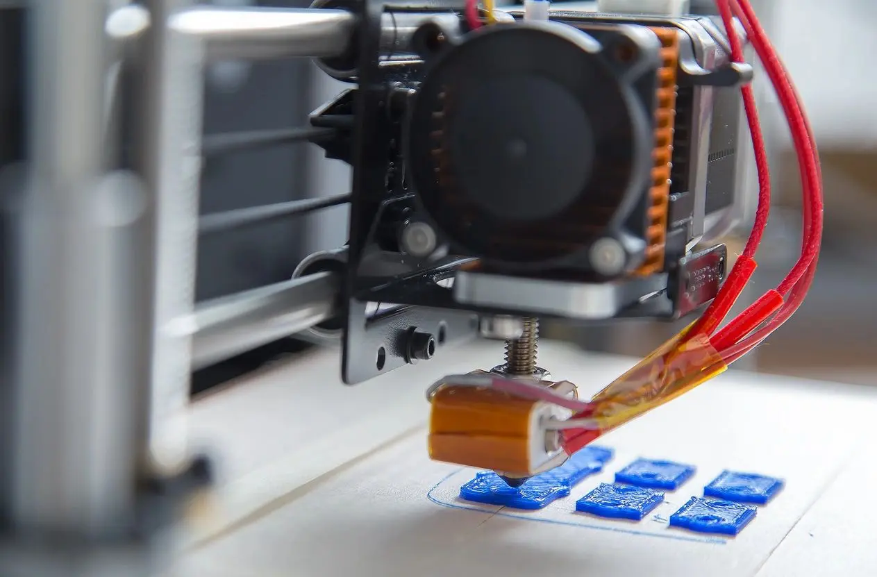 A 3 d printer is being used to print something.